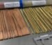 Full size flux coated nickel bronze TIG/OXY rods laid out for industrial quality inspection